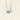 A silver-toned necklace with a marquise-cut clear gemstone pendant, suspended against a plain off-white background.