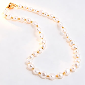 Handcrafted Marais baroque pearl statement necklace with 14k gold toggle clasp in Copenhagen.