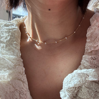 Gold plated silver necklace layered with other chains. Mini ball chain design with silver mix finish. Handcrafted in Denmark.