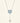 Minimalist sterling silver necklace featuring a double snowflake drop pendant on a delicate chain, shot against a clean neutral background.