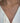 A close-up of a person's neck and upper chest wearing a delicate gold chain necklace and a white blouse.