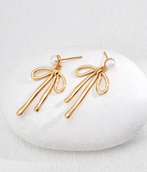 Ophelia Bow Pearl Earrings – 5mm freshwater pearl with delicate S925 silver/gold bow on hypoallergenic stud, perfect for summer outfits.