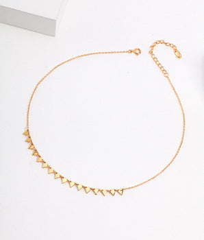 Close-up of hand-finished serrated edges on 18K gold vermeil chain, highlighting artisan craftsmanship