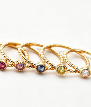 Handcrafted 18K gold-plated sterling silver twist birthstone ring with birthdays gemstones